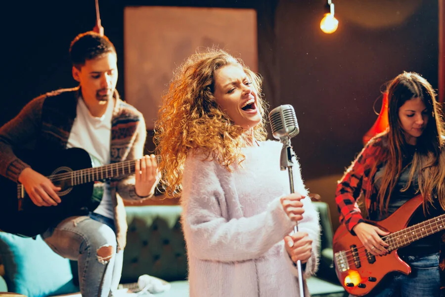 A singer performing with her band